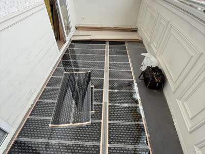 Монтаж инфракрасного тёплого пола EASTEC на лоджии по ул. Залесского, 2/4 в Новосибирске — уют, комфорт и тепло от компании «Буран Климат»