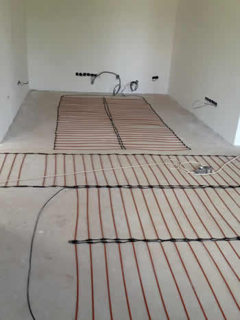 Монтаж теплых полов в загородном коттедже Монтаж теплых полов в загородном коттедже