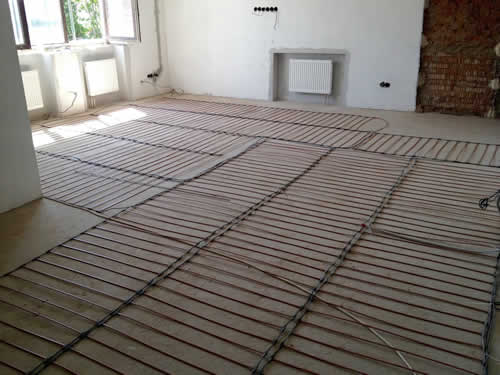 Монтаж теплых полов в загородном коттедже Монтаж теплых полов в загородном коттедже